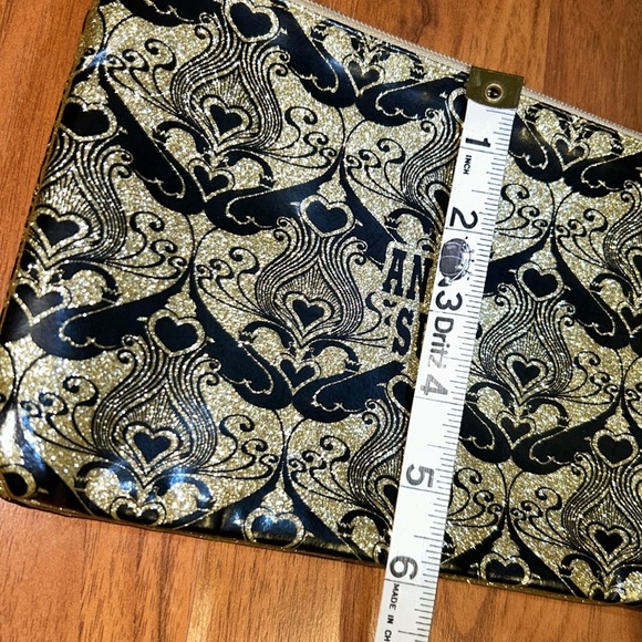 Anna Sui Black and Gold Glitter Double Wristlet Pouch